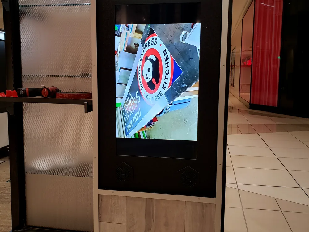Custom commercial retail kiosk fabricated and installed by S2
