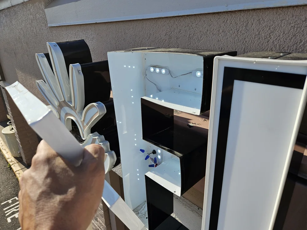 Custom dimensional logo components during fabrication