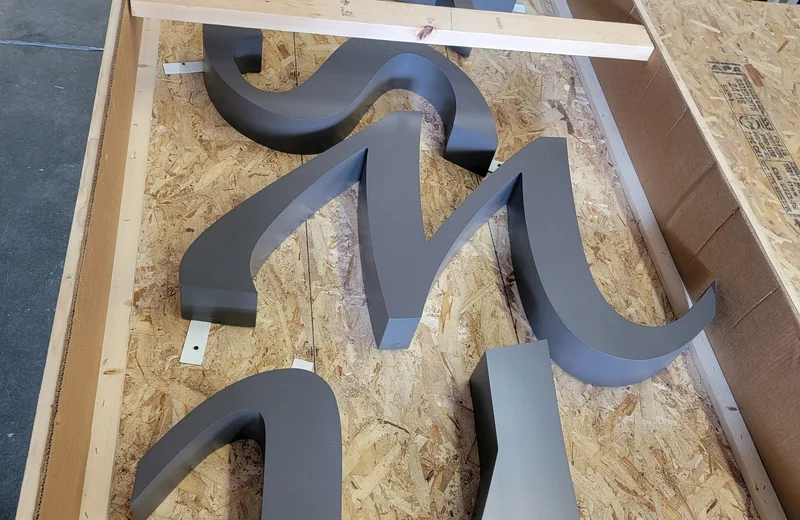 Fabricated metal dimensional letters prepared by S2 Sign Company