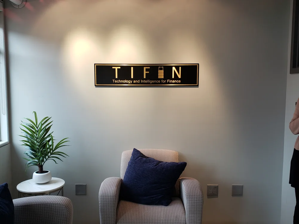 Illuminated dimensional sign in a commercial reception area