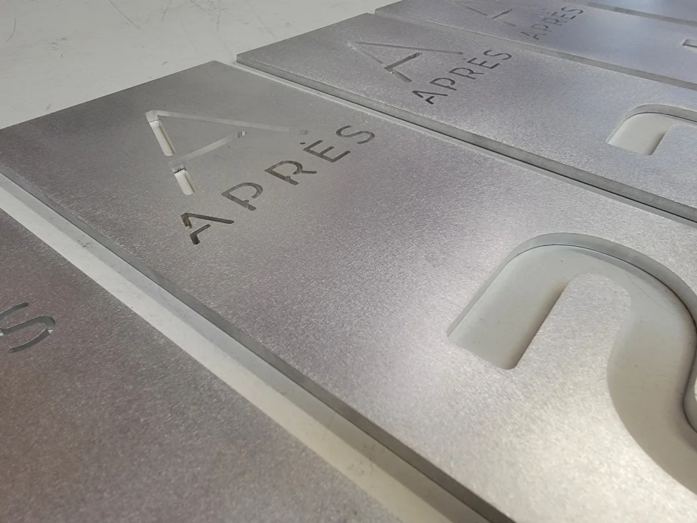 Machined metal identification plates fabricated by S2