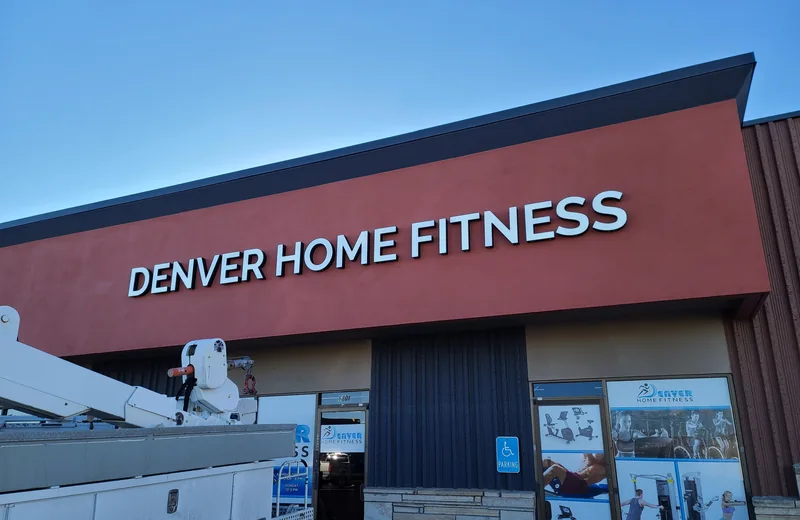 Red and white front-lit channel letters for Denver Home Fitness