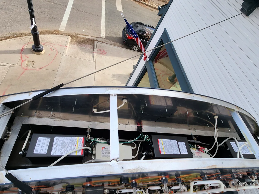 Commercial exterior fixture open during service and wiring inspection