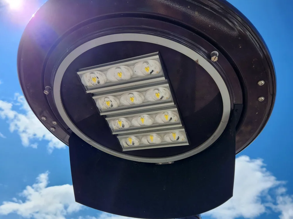 Commercial LED parking lot fixture head viewed from below