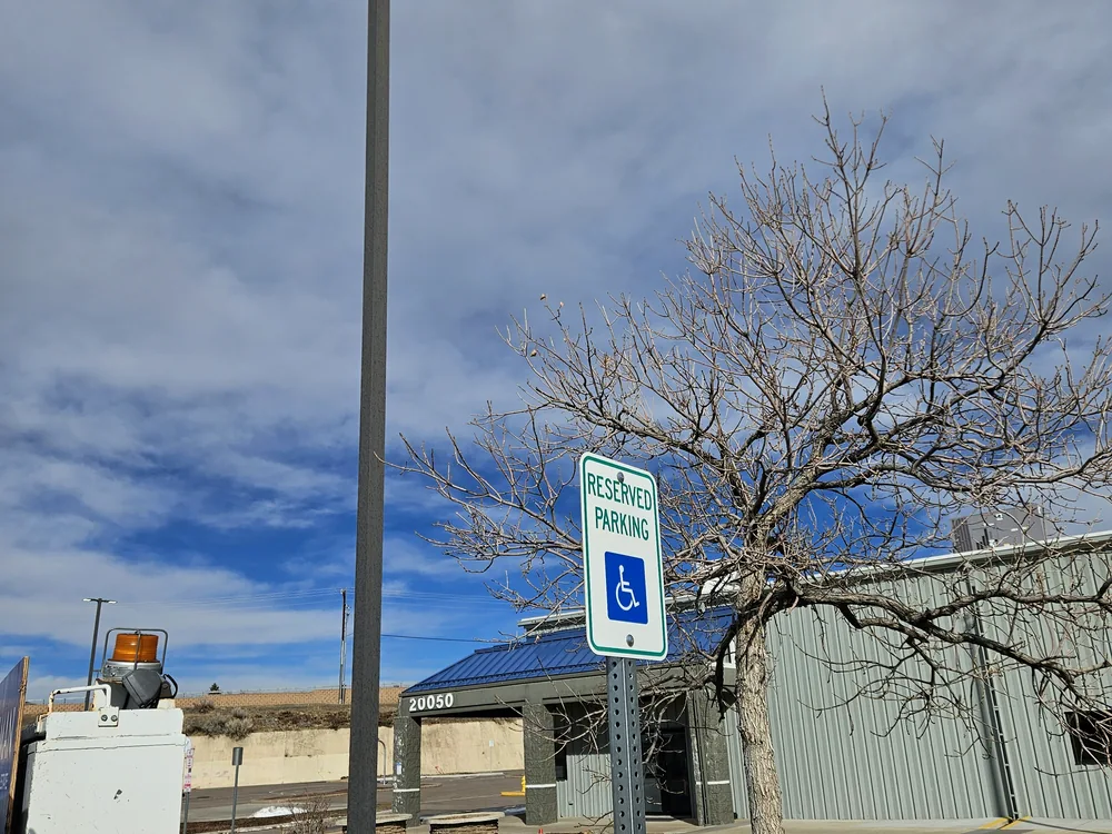 Parking lot LED fixtures and pole during S2 commercial lighting service