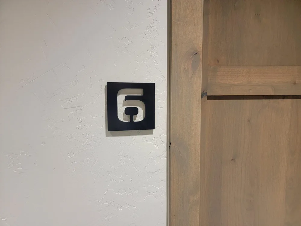 Small acrylic suite identification panel