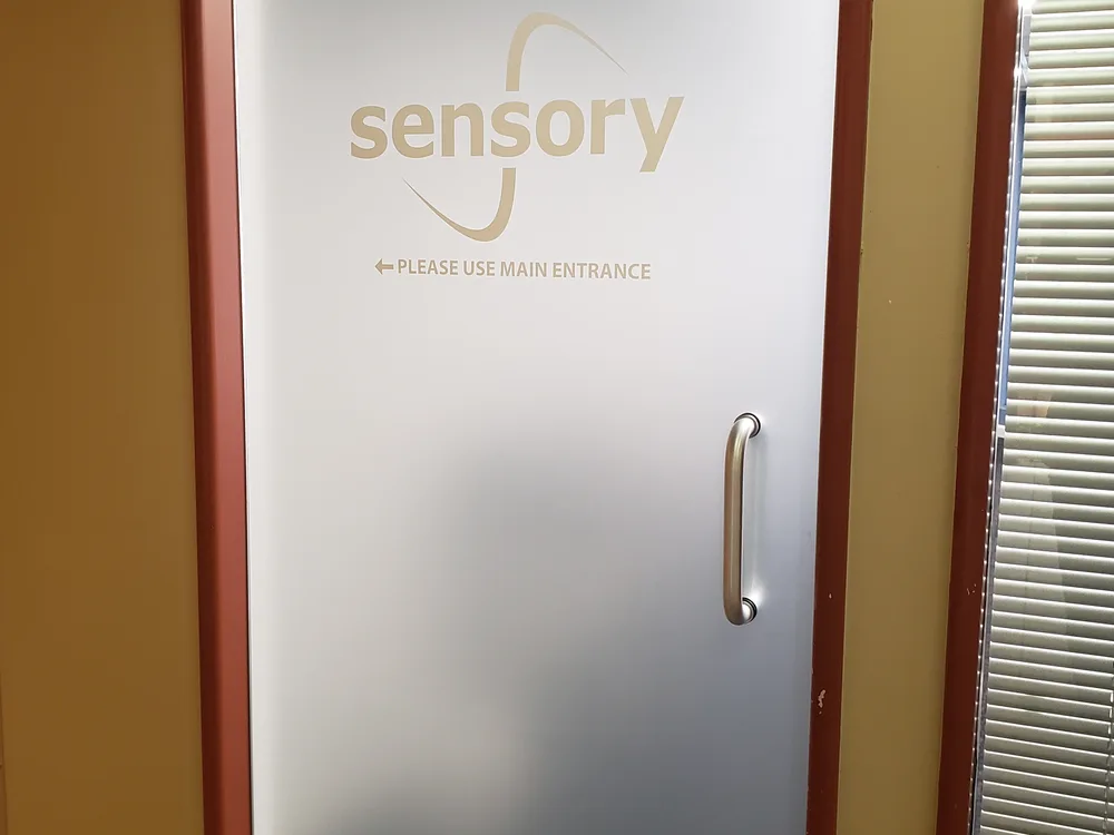 Small cut-vinyl door identity graphic