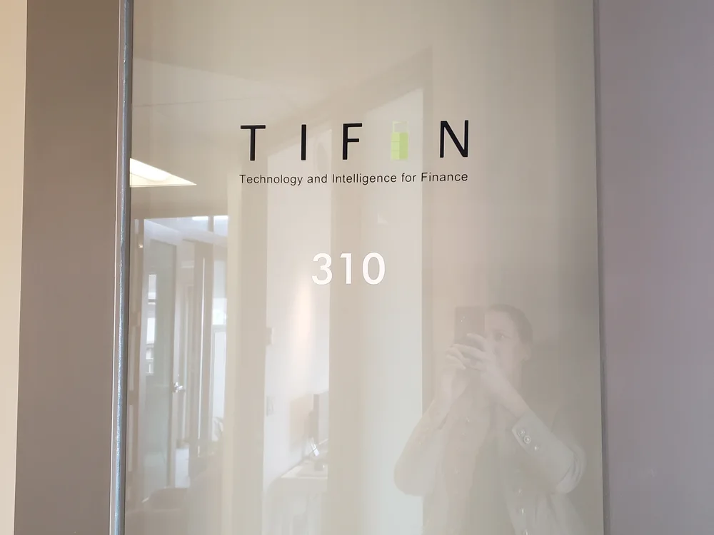 Suite identification applied to a glass office door