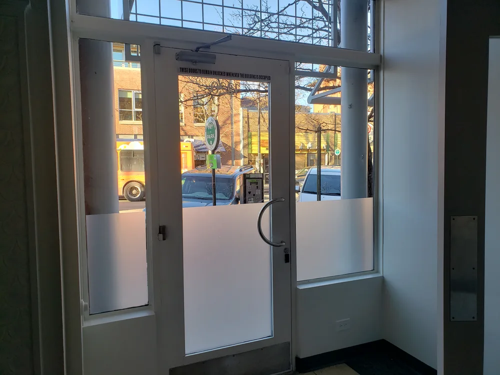 Frosted privacy bands on commercial doors