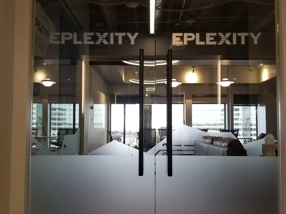 Branded glass entry doors
